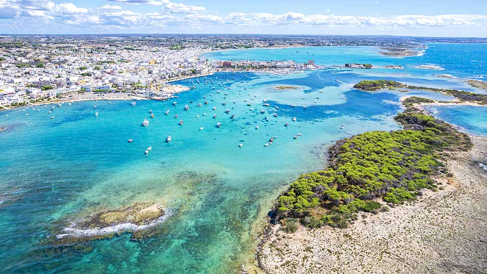 Porto Cesareo town and harbour viewed from offshore